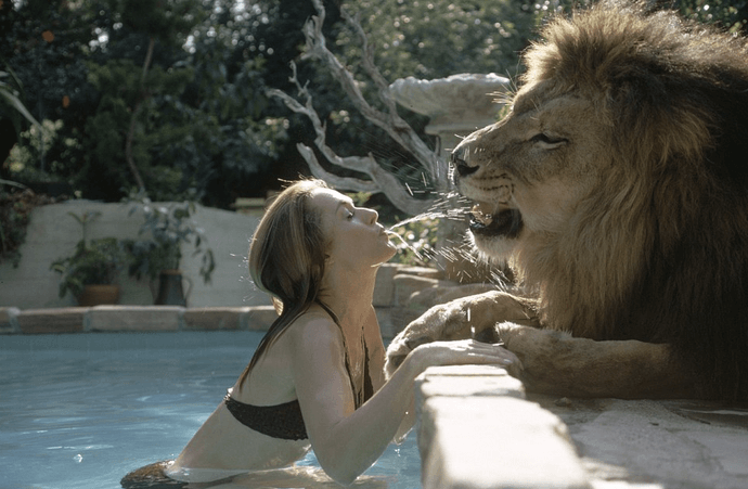 Tippi Hedren with a lion